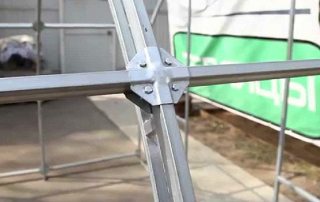 Système de crabe pour tubes profilés