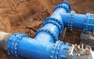 Té à bride en fonte